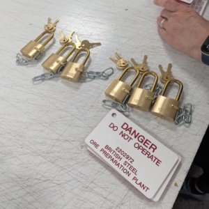 Engraved brass safety padlocks and custom danger tags