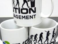 Set of three white ceramic promotional mugs branded for Evolution Waste Management. The mugs feature a bold black logo and typography, incorporating an evolutionary-style silhouette graphic transitioning into a figure disposing of waste in a recycling bin. The company name and contact details are printed on the mugs, alongside a colourful circular logo.