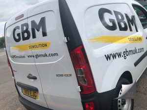 GBM Demolition vehicle graphics.
