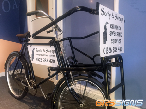 Sooty & Sweep branded tricycle.