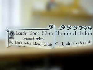 Engraved, painted and paint-filled oak signs for Louth Lions Club