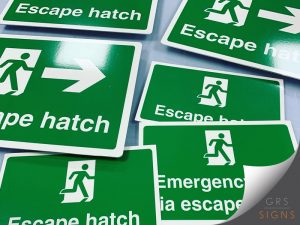 Emergency escape hatch signage.