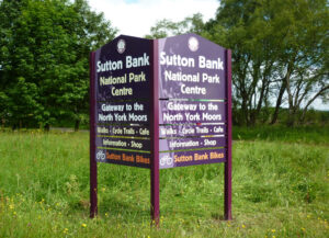 A freestanding modular sign installed outside for Sutton Bank National Park Centre and North York Moors.