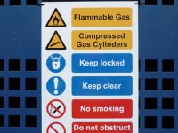 Warning, mandatory and prohibition safety sign, includes cut-out holes so it is able to be mounted to a fence (as shown with zip-ties)